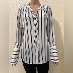 A chic black and white striped blouse from White House Black Market!